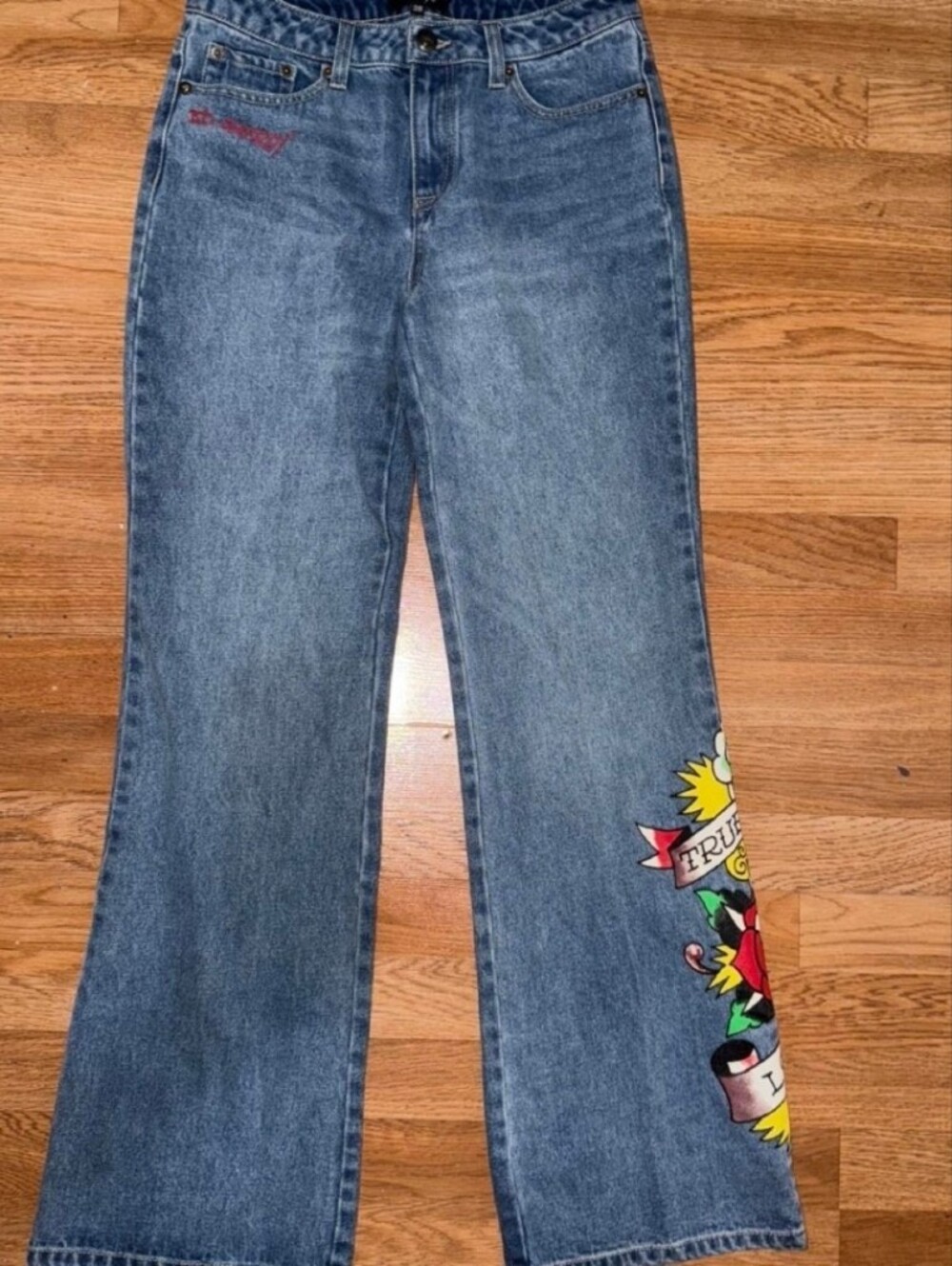 Ed Hardy Blue Denim Wide-Leg Jeans with Multicolor Leg Tattoo Graphic
